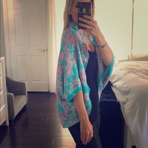 Reversible coral shrug pink/teal